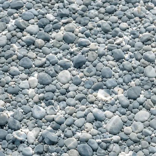 Close-up of a blue-gray pebble aggregate pool finish